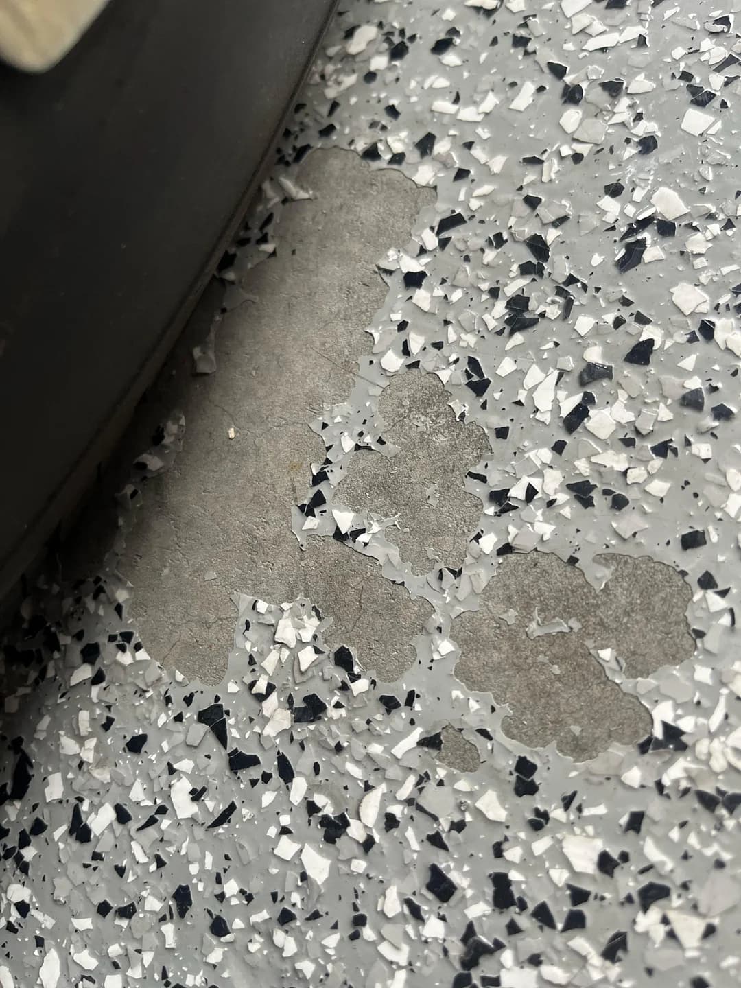 Epoxy floor coating peeling from poor prep